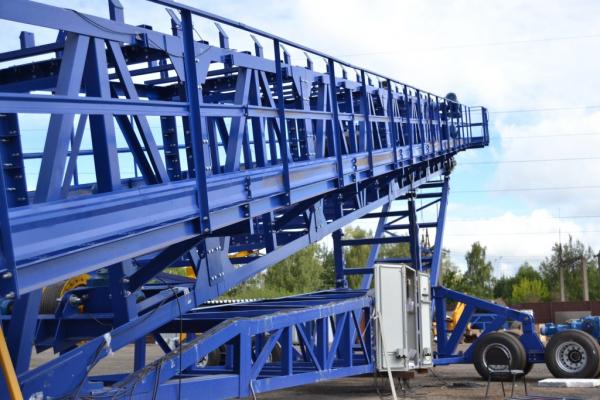 Радиальный телескопический штабелеукладчик